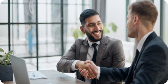 Business partners shaking hands